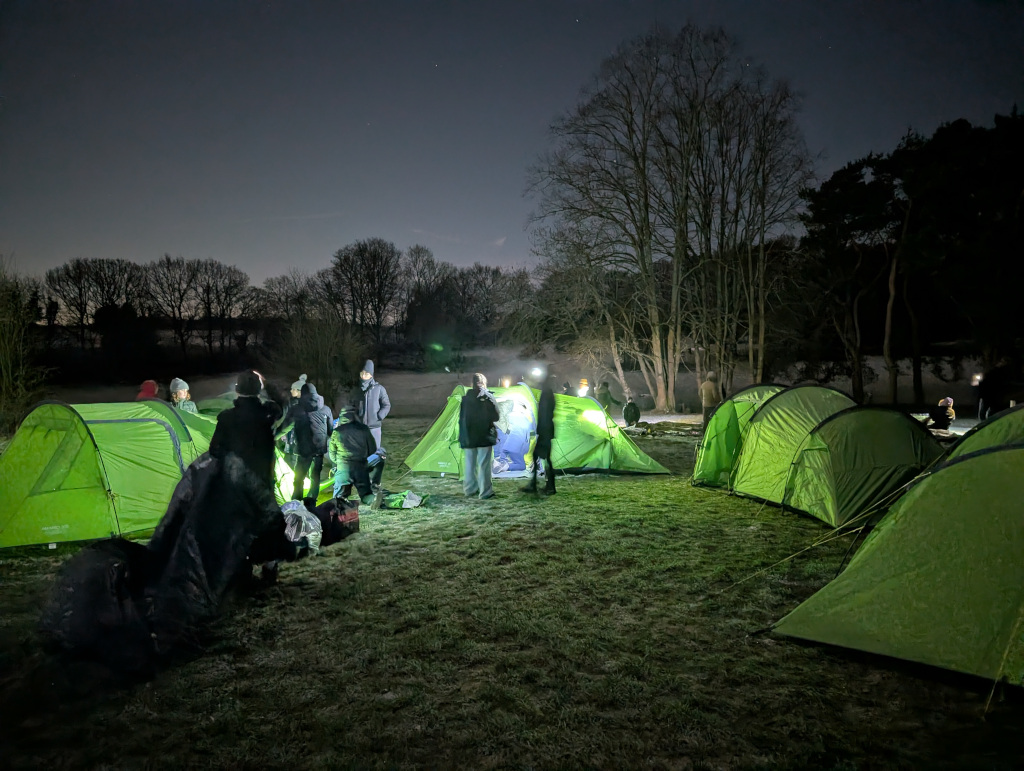 2nd/9th Ruislip Scouts pitching their tents by torchlight