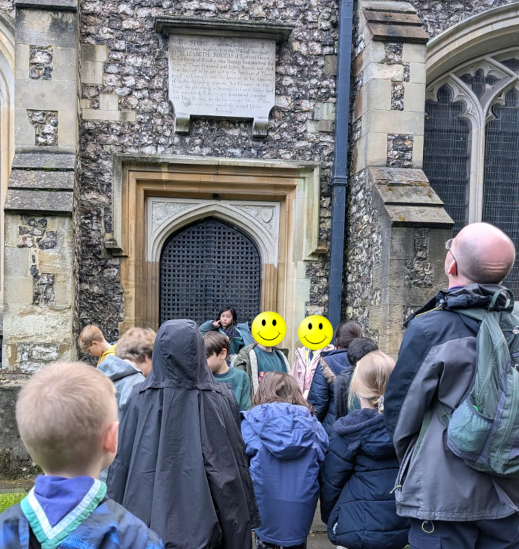 Cubs looking at the outside of St Martin’s Church