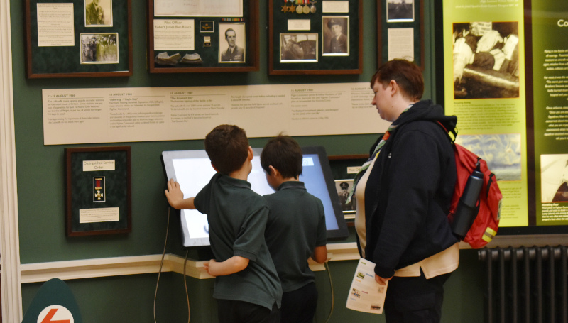 Cubs looking at the Bentley Priory Museum exhibits