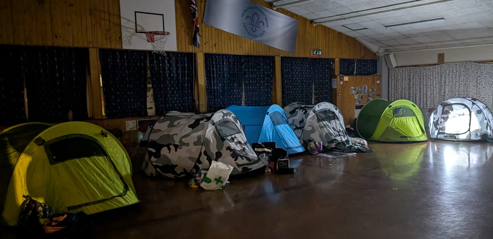 Tents lined up inside the hall